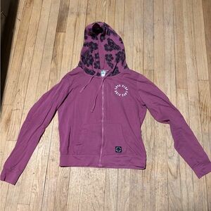 Victorias Secret LOVE PINK Zip-Up Hoodie with Hibiscus Flower detail.